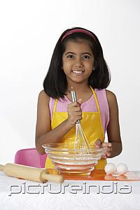 PictureIndia - Girl baking