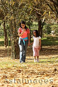 Asia Images Group - Mother and daughter walking in park