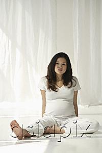 AsiaPix - Pregnant woman relaxing
