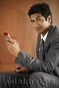 Asia Images Group - businessman on mobile phone