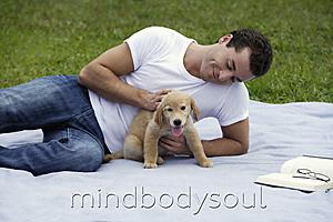 Mind Body Soul - man at park with puppy