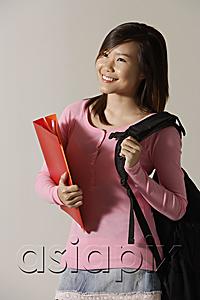 AsiaPix - Young woman with backpack and folder.