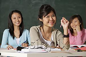 AsiaPix - Three women in classroom.