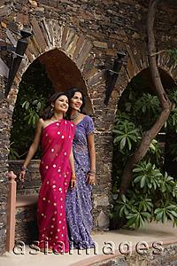 Asia Images Group - young women wearing saris