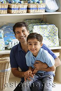 Asia Images Group - father and son in store