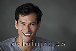 Asia Images Group - portrait of man looking at camera, smiling