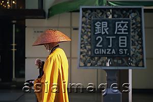 Asia Images Group - Japan,Honshu,Tokyo,Monk Walking on The Ginza