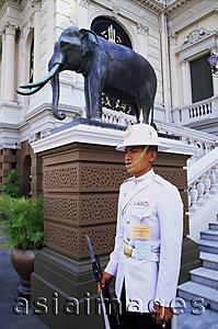 Asia Images Group - Thailand,Bangkok,Wat Phra Kaeo,Grand Palace,Guard at the Royal Palace