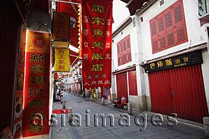 Asia Images Group - Red signs on narrow street in Macau