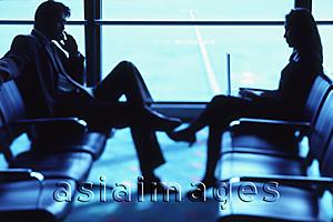 Asia Images Group - Two executives in airport lounge