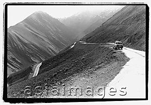 Asia Images Group - India, Northern India, Srinagar-Leh Road, Car parked along road, mountains at background.