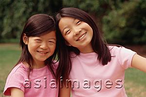Asia Images Group - Two sisters smiling, portrait