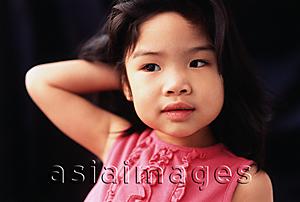 Asia Images Group - Young girl with hand behind head