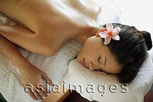 Asia Images Group - Young woman receiving back massage