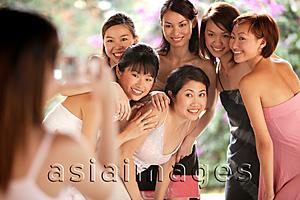 Asia Images Group - Group of young women, posing for camera, smiling