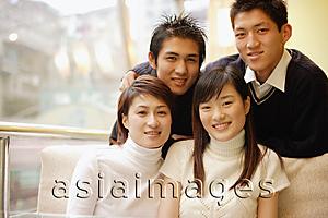 Asia Images Group - Young adults posing, looking at camera