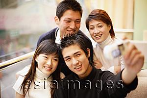Asia Images Group - Young adults posing for photograph