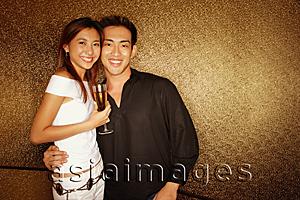 Asia Images Group - Couple looking at camera smiling