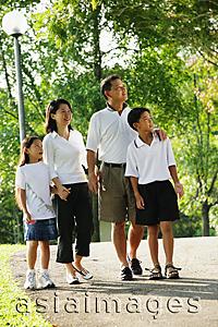Asia Images Group - Family with two children, walking in park