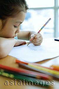 Asia Images Group - Young girl drawing, resting chin on arm