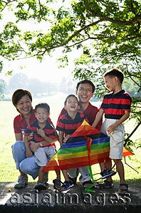 Asia Images Group - Family with three boys, outdoors, smiling at camera