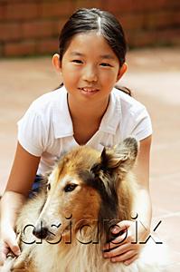 AsiaPix - Girl with dog, looking at camera