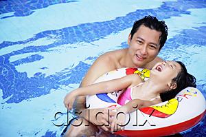 AsiaPix - Father with one daughter in swimming pool