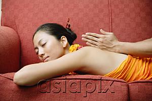 AsiaPix - Woman getting a massage, eyes closed