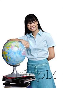 AsiaPix - Woman leaning on globe, smiling at camera