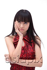 AsiaPix - Young woman, hand on face, looking away