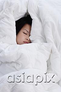 AsiaPix - Young woman covered by blanket, sleeping