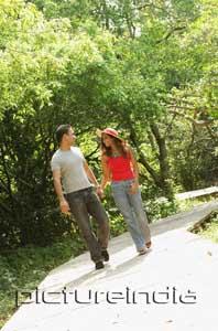 PictureIndia - Couple holding hands and walking in park