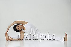 AsiaPix - Woman in practicing yoga