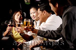 Asia Images Group - Couples toasting with drinks