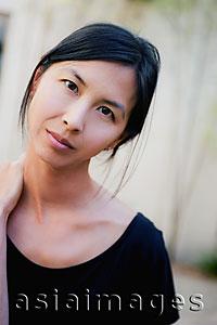Asia Images Group - Head shot of woman with hand on shoulder