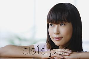 AsiaPix - Young woman looking away, head shot